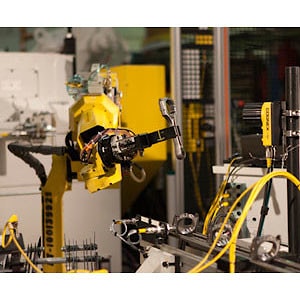 Двухдисковая шлифовальная система, разработанная C & B Machinery для General Motors  